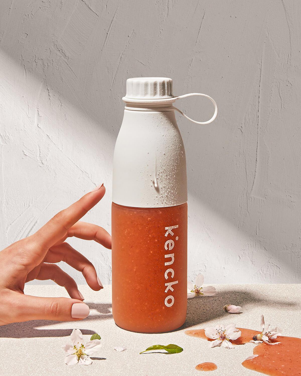 kencko bottle with golden plums smoothie